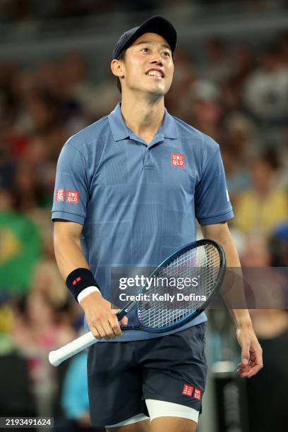 Kei Nishikori of Japan celebrates winning a set against Thiago Monteiro of Brazil in the Men's Singles First Round during day one of the 2025...