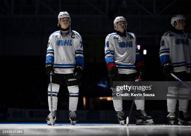 Michael Misa of the Saginaw Spirit stands for the national anthem before the game between the OHL East and OHL West conferences during the Connor...