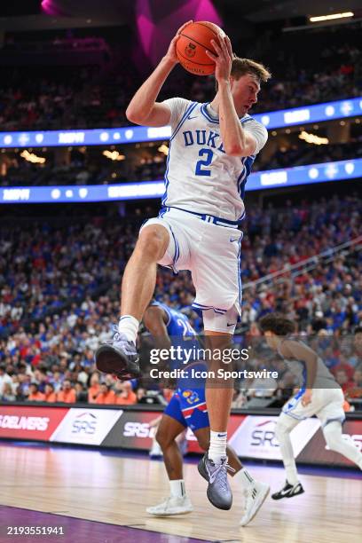Duke Blue Devils guard Cooper Flagg jumps for a rebound during the Terry's Chocolate Vegas Showdown college basketball game between Duke Blue Devils...
