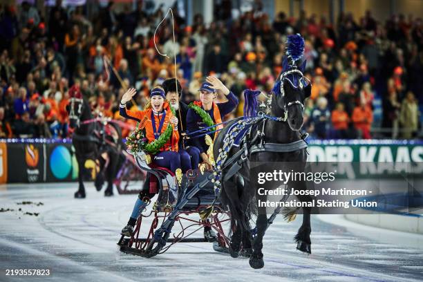 Antoinette Rijpma-De Jong of Netherlands and Sander Eitrem of Norway celebrates winning the overall allround Championship title and as is the...