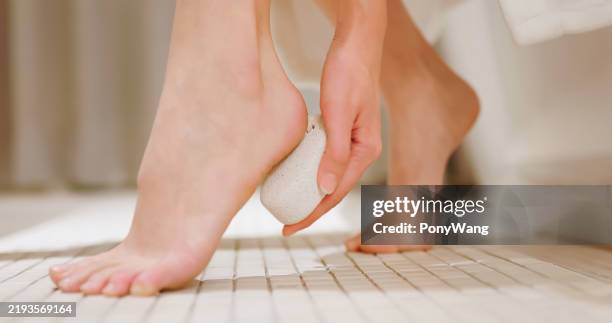 asian female skincare heel bathroom - dark pedicure stock pictures, royalty-free photos & images