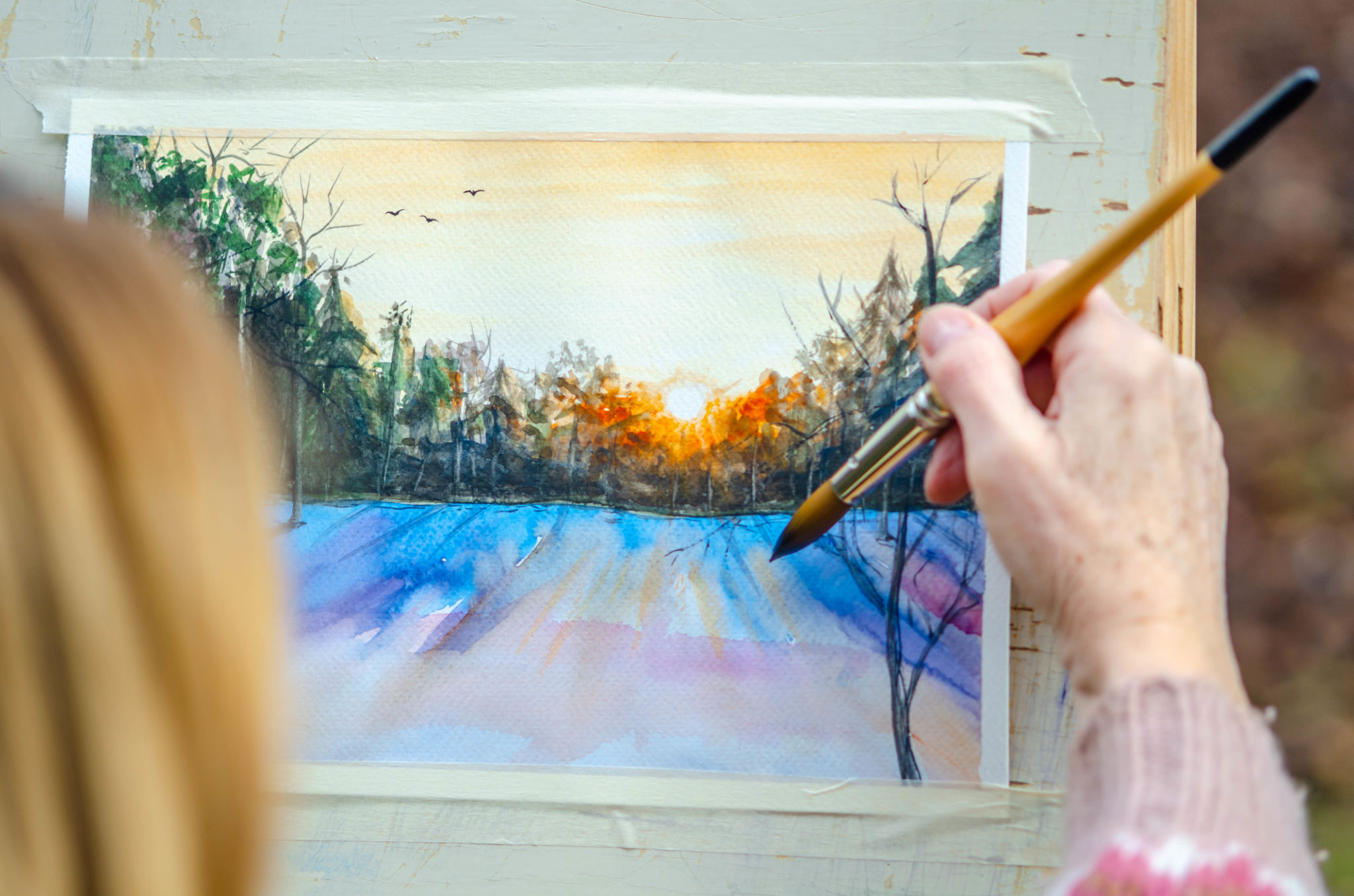 elderly woman painting