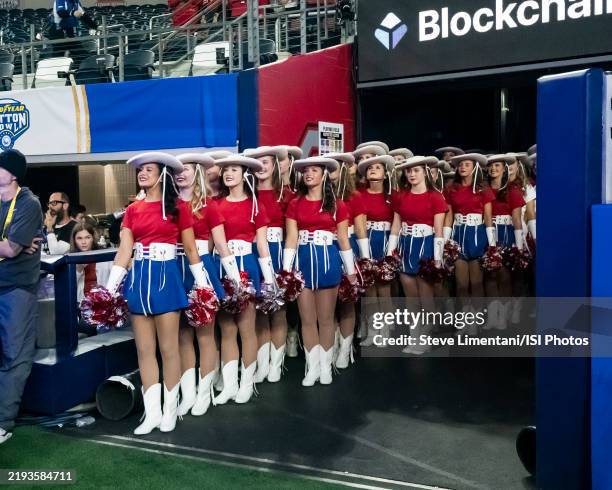 The Dallas Cowboy Cheerleaders prior to a game between the Ohio State Buckeyes and the Texas Longhorns at the Goodyear Cotton Bowl at AT&T Stadium on...