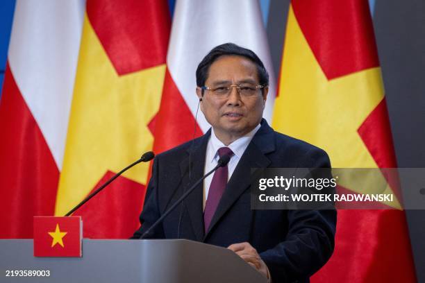 Vietnam's Prime Minister Pham Minh Chinh addresses a joint press conference with the Polish Prime Minister after their meeting in Warsaw on January...