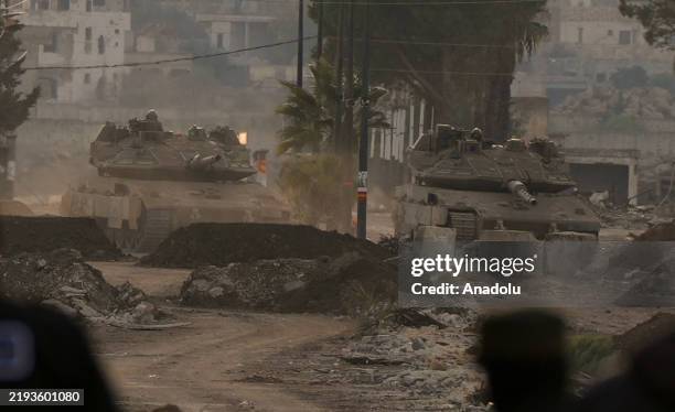 Israeli tanks are seen at Al Hamadyeh region near the Golan Heights in Quneitra, Syria on January 16, 2025.