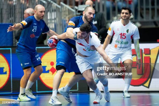 Algeria's centre back Moustafa Hadj Sadok and Algeria's right winger Redouane Saker vie with Italy's pivot Endrit Iballi and Italy's wing Jeremi Nino...