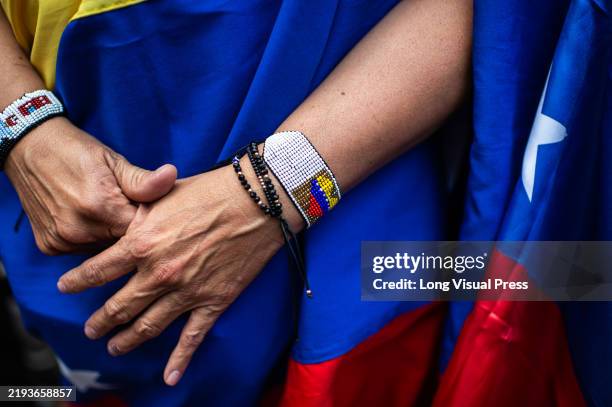 Venezuelan citizens in Colombia, demonstrate in support of opposition leader Edmundo Gonzalez a day before the inauguration day of the Venezuelan...