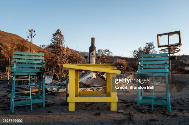 Street view of the remains of a restaurant destroyed by the Palisades wildfire on January 13, 2025 in Malibu, California. Multiple wildfires fueled...