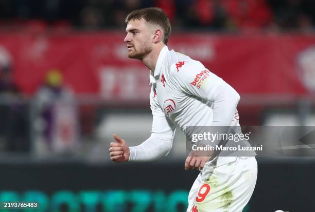 Lucas Beltran of ACF Fiorentina celebrates after scoring their team's first goal from the penalty spot during the Serie A match between AC Monza and...