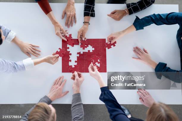 problem solving - solving puzzle stock pictures, royalty-free photos & images