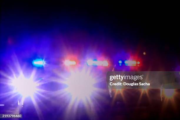police cars in a chase - emergency services vehicle stock pictures, royalty-free photos & images