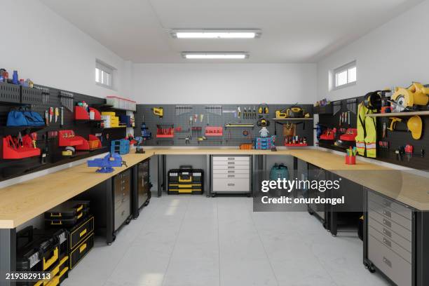 empty garage interior with tools, working equipments and toolboxes - casa de reparações imagens e fotografias de stock