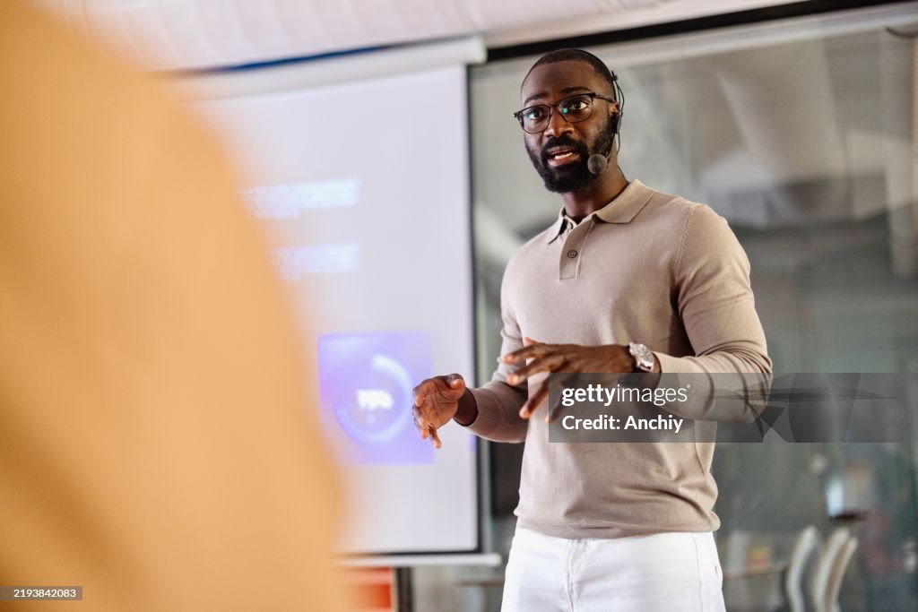 Close-up of a black man leading an AI seminar