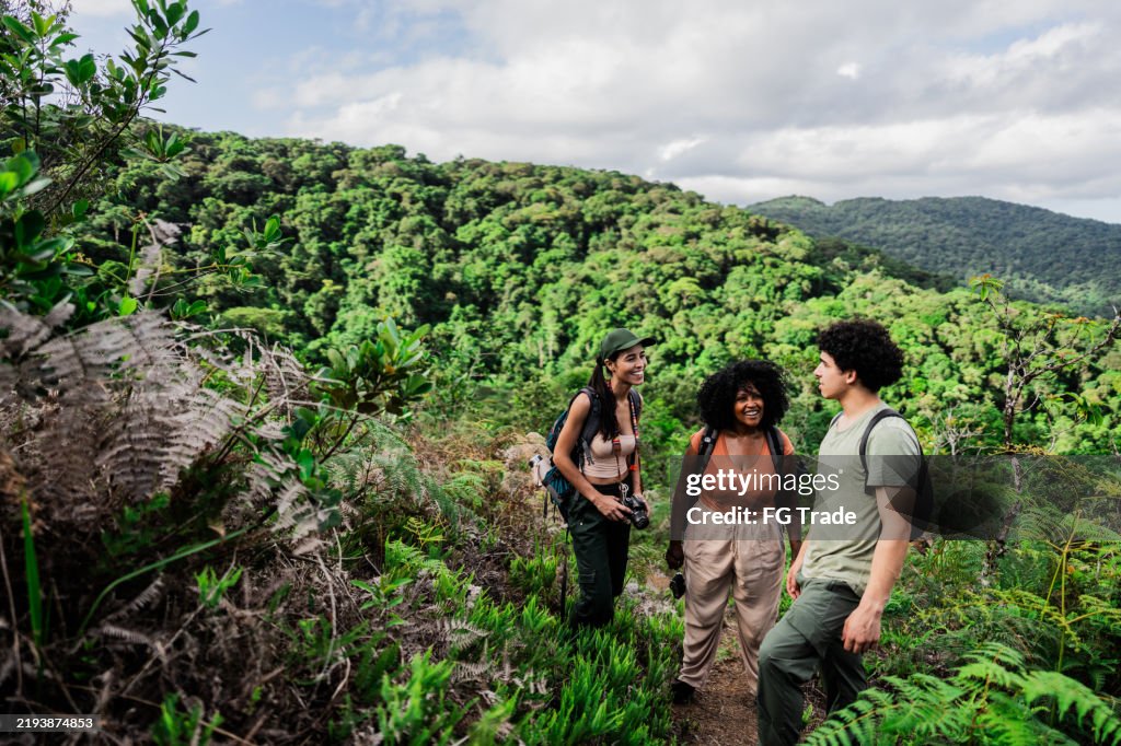 Friends talking on forest