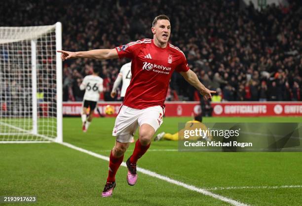 Chris Wood of Nottingham Forest celebrates scoring his team's first goal during the Premier League match between Nottingham Forest FC and Liverpool...