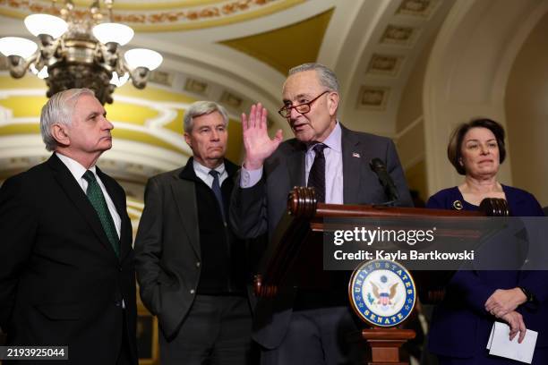 Sen. Jack Reed , Sen. Sheldon Whitehouse , Sen. Minority Leader Charles Schumer , and Sen. Amy Klobuchar call on reporters following the weekly...