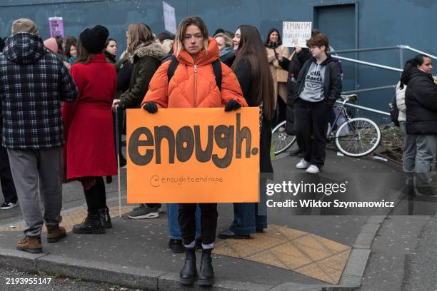 Demonstrators gather ahead of marching in solidarity with all oppressed women around the world and against rising violence against women and girls,...