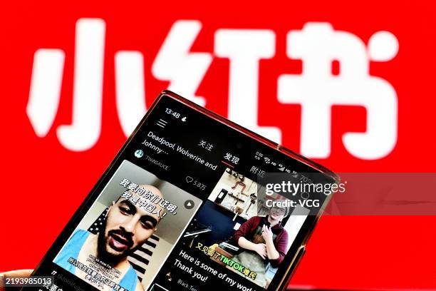 The photo illustration shows a phone screen as American TikTok users pouring into the Chinese Social Media Platform Xiaohongshu, which translates as...