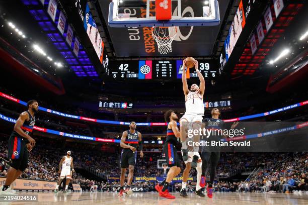 Devin Booker of the Phoenix Suns dunks the ball during the game against the Detroit Pistons on January 18, 2025 at Little Caesars Arena in Detroit,...