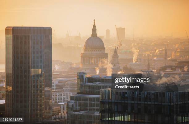golden sunrise over st. paul's cathedral in london, england, uk - pollution stock pictures, royalty-free photos & images