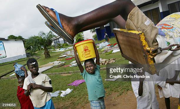 sos childrens village opens doors to displaced liberians - monrovia liberia stock pictures, royalty-free photos & images