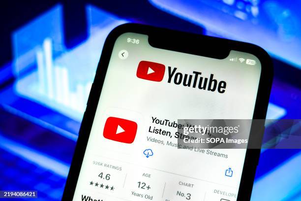 In this photo illustration, a YouTube app logo is displayed on an iPhone in the Apple Store.