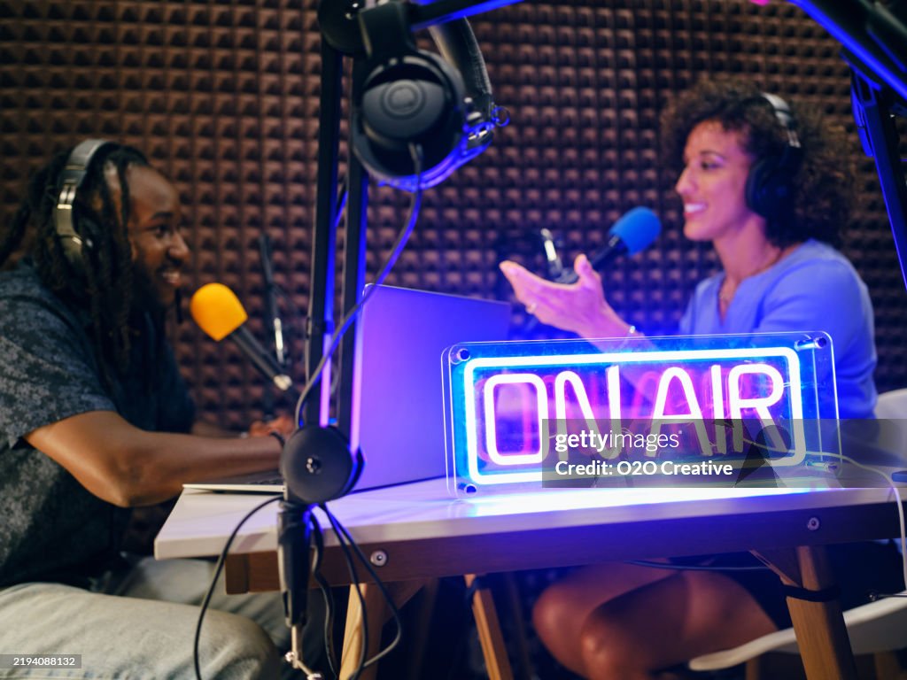 Podcasters Recording in a Studio