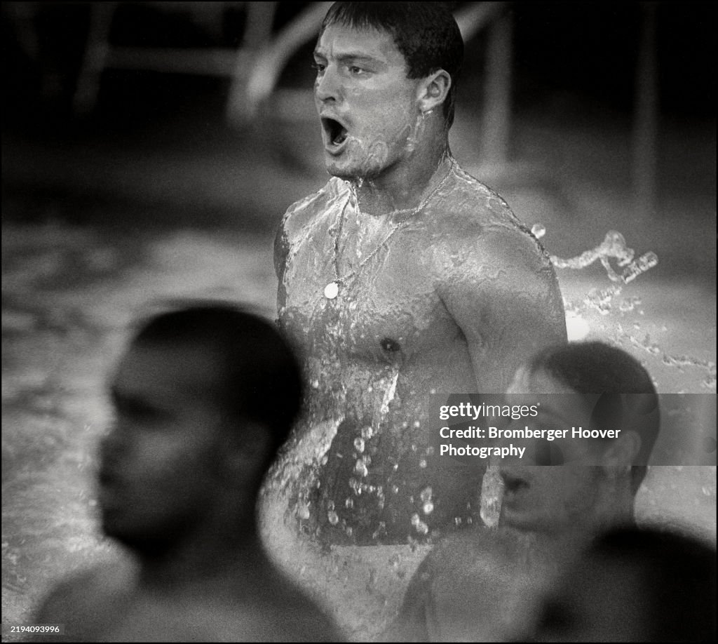 UC Berkely Football Players In A Pool