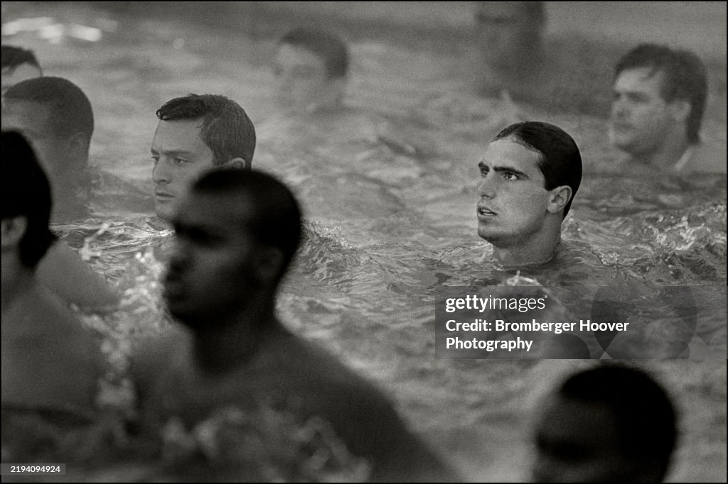 UC Berkely Football Players In A Pool