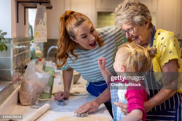 playful baking laughs - baked stock pictures, royalty-free photos & images