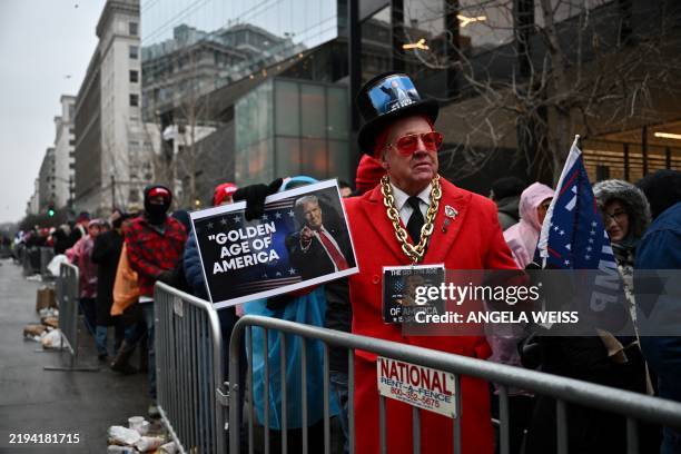 Supporters of US President-elect Donald Trump wait outside for a MAGA victory rally at Capital One Arena in Washington, DC, on January 19 one day...
