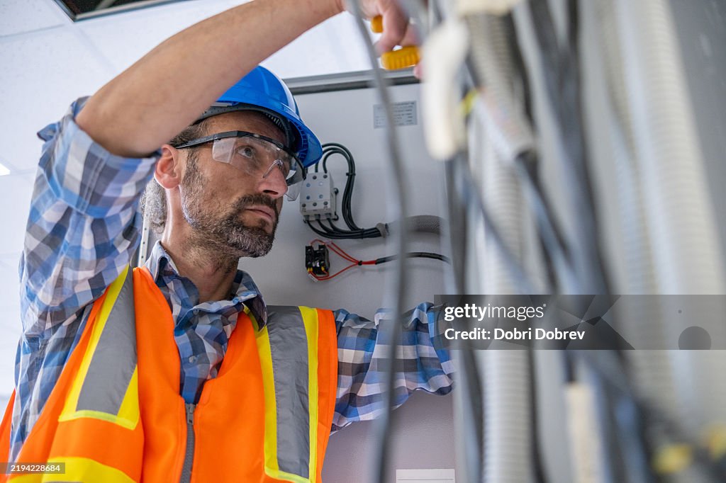 Construction electrical engineer on a construction site.