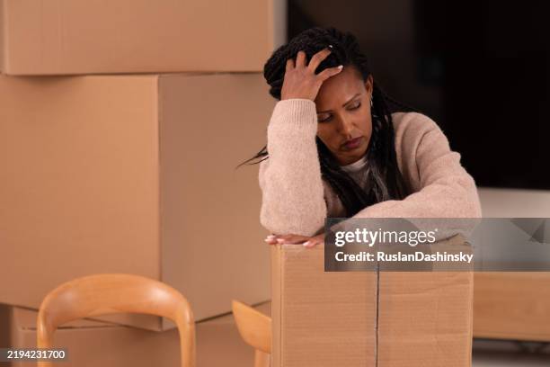 overwhelmed by the moving process. - tv in patient room stock pictures, royalty-free photos & images