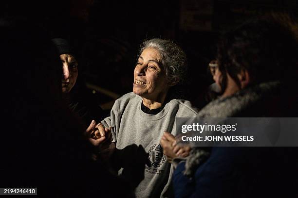 Palestinian prominent prisoner Khalida Jarrar, a figure in the Marxist Popular Front for the Liberation of Palestine , is greeted by well-wishers...