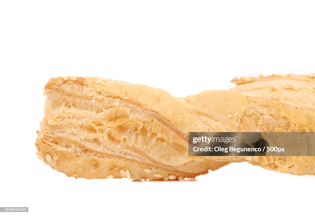 Cheese stick cracker with sesame seeds