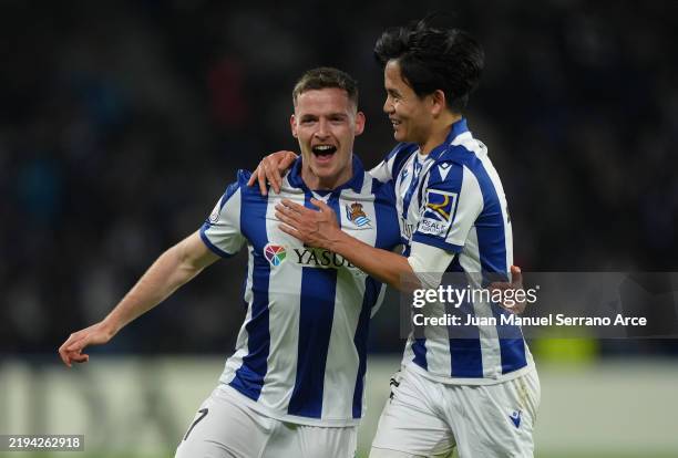 Sergio Gomez of Real Sociedad celebrates scoring his team's third goal with teammates during the Copa Del Rey match between Real Sociedad and Rayo...