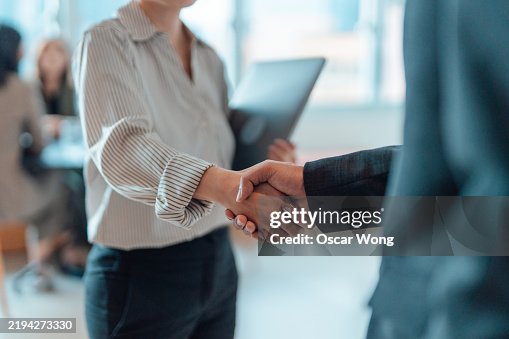 Handshake for successful partnership and business agreement Handshake for successful partnership and business agreement