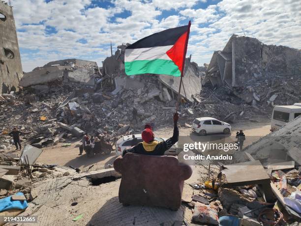 Palestinians returning to Tel Al-Sultan in Gaza Strip following the ceasefire agreement between Hamas and Israel, face massive destruction in Rafah,...