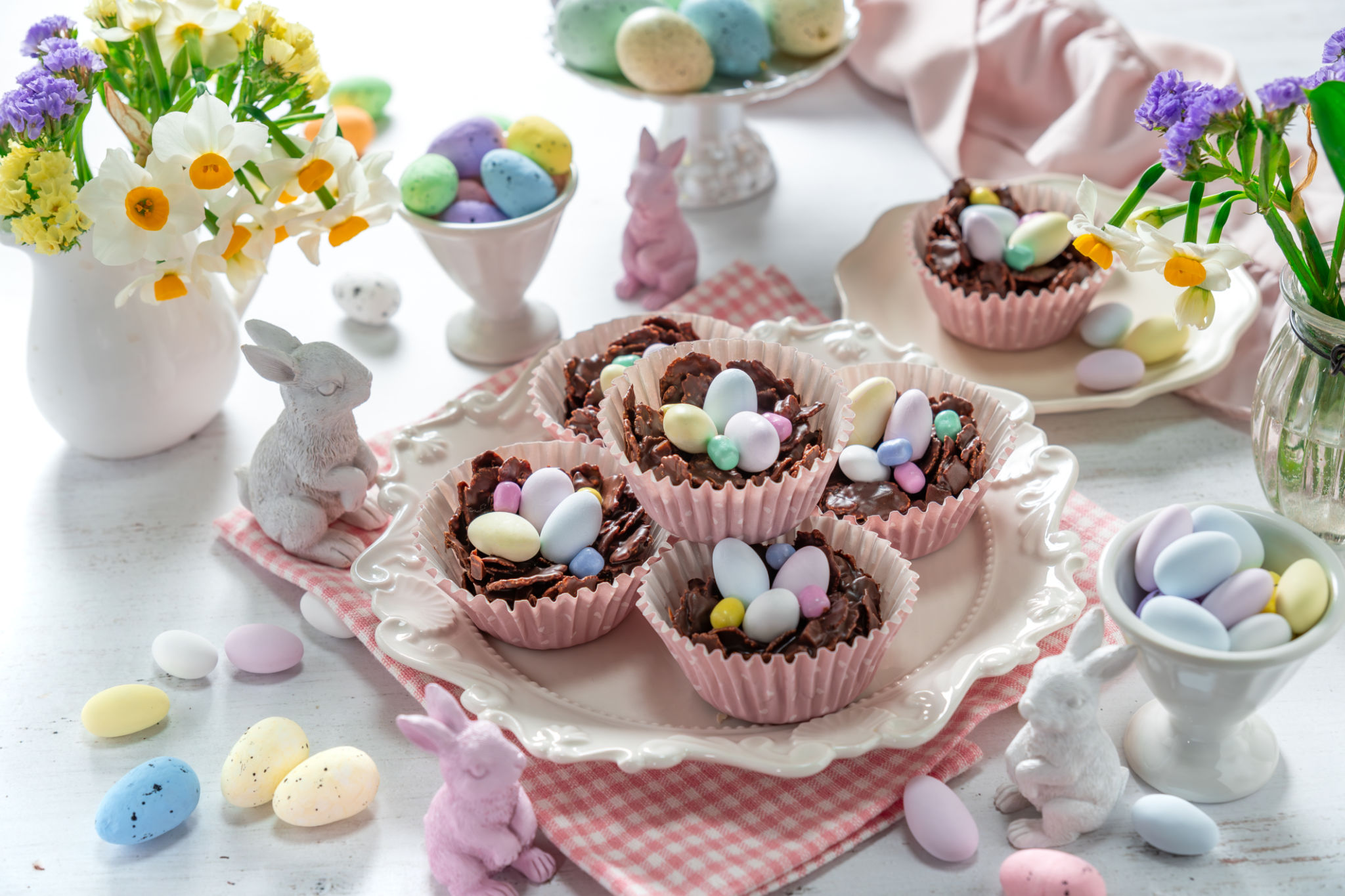 Easter egg nest cakes, cornflakes covered in milk chocolate topped with a miniature easter egg Easter egg nest cakes, cornflakes covered in milk chocolate topped with a miniature easter egg