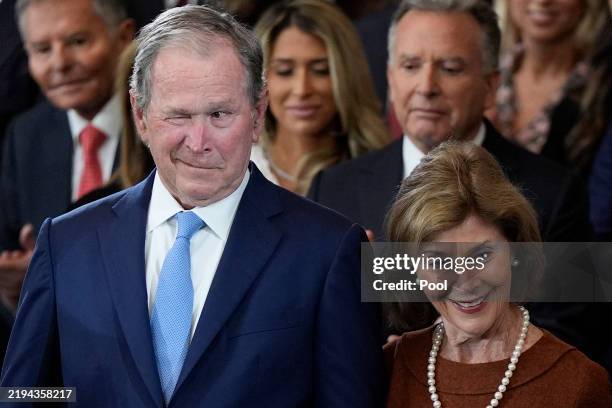 Former President George W. Bush and former first lady Laura Bush attend the Inauguration of Donald J. Trump in the U.S. Capitol Rotunda on January...