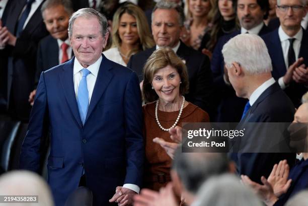 Former President George W. Bush and former first lady Laura Bush attend the Inauguration of Donald J. Trump in the U.S. Capitol Rotunda on January...
