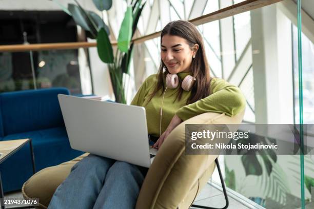 spending time in a campus cafeteria - young women stock pictures, royalty-free photos & images