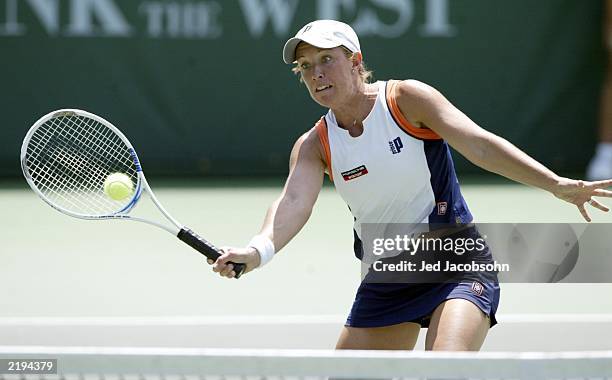 Lisa Raymond of the USA returns a shot against Angela Haynes of the USA during the Bank of the West Classic at Stanford University on July 24, 2003...