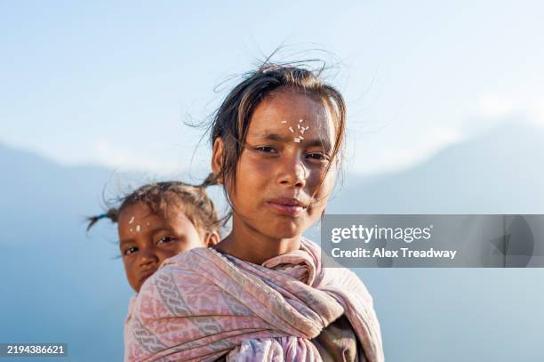two nepalese girls in the hills in nepal - nepal family stock pictures, royalty-free photos & images