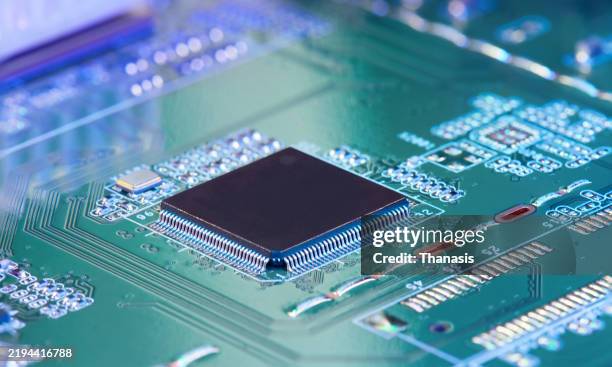 close-up on a computer chip - chip stock-fotos und bilder