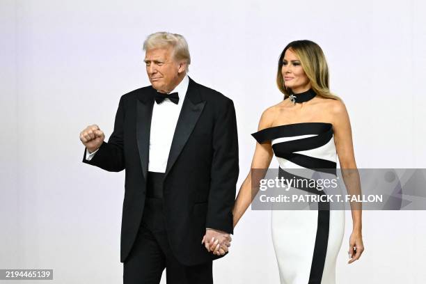 President Donald Trump and First Lady Melania Trump arrive at the Commander-In-Chief inaugural ball at the Walter E. Washington Convention Center in...