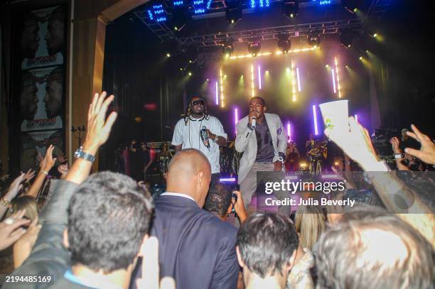 Singer T-Pain and rapper Kanye West perform at the Rolling Stone private party and concert at The Joint inside Hard Rock Hotel & Casino on September...