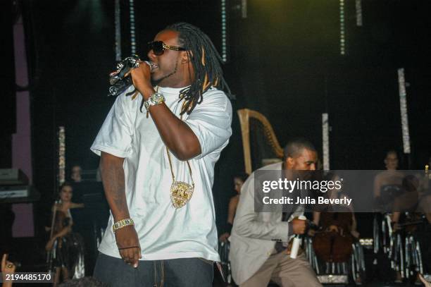 Singer T-Pain and rapper Kanye West perform at the Rolling Stone private party and concert at The Joint inside Hard Rock Hotel & Casino on September...