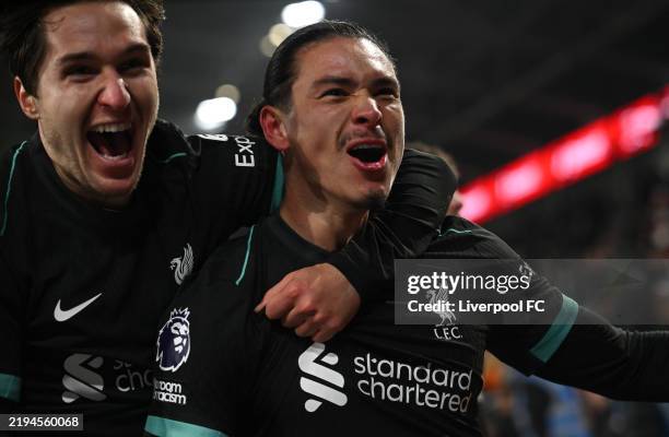Darwin Nunez of Liverpool celebrates scoring his team's second goal with teammate Federico Chiesa during the Premier League match between Brentford...
