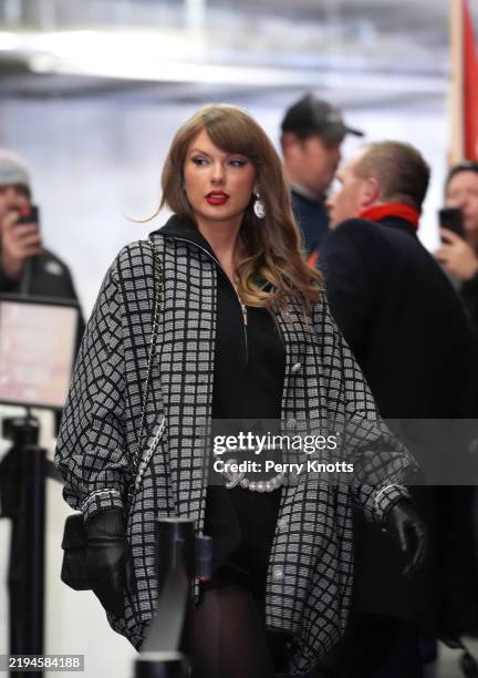 Taylor Swift arrives prior to the AFC Divisional Playoff game between the Houston Texans and Kansas City Chiefs at GEHA Field at Arrowhead Stadium on...